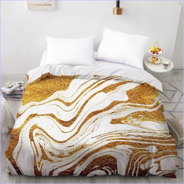 housse de couette blanche et dorée