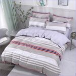housse de couette blanche et grise