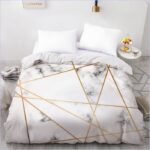 Housse de couette blanche et or