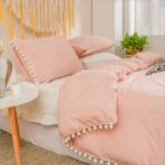 housse de couette rose à pompons